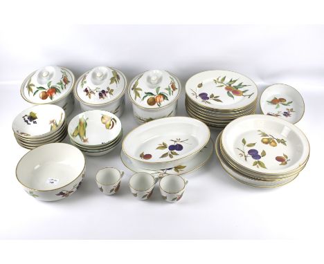 A Royal Worcester Evesham part dinner service. Including three tureens, nine 10" dinner plates, bowls, serving dishes, etc.