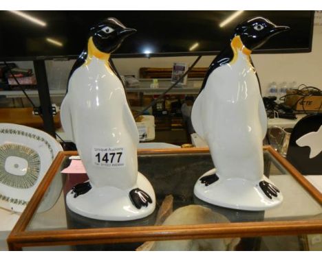 A pair of Poole pottery penguins.