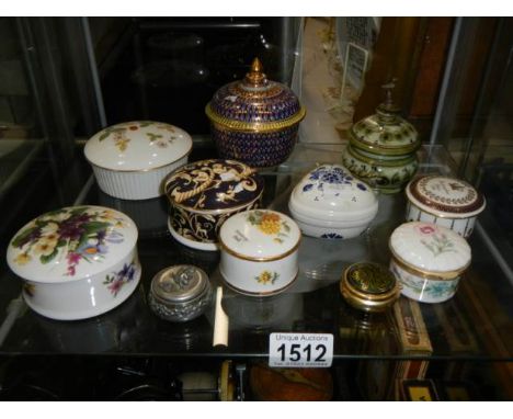 Eleven assorted trinket/pill boxes.