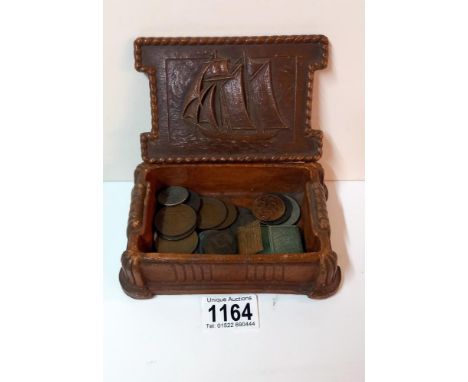 A decorative box with ship design &amp; contents including Victorian coins &amp; cyma miniature clock