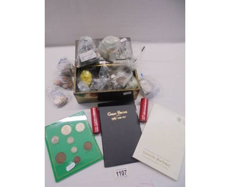 A vintage tin of old coins including a George V 1936 type set.