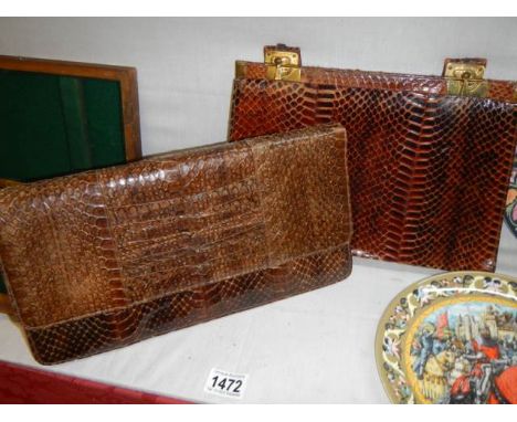 Two vintage snakeskin hand bags.
