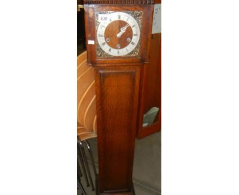 An Edwardian oak Westminster chime Granddaughter clock (no key or pendulum). COLLECT ONLY.