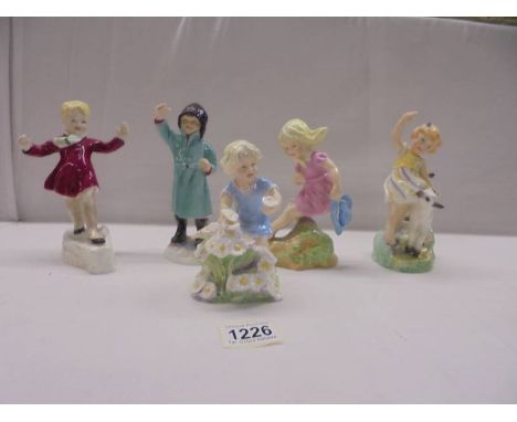 Five Royal Worcester Months of the Year figurines - January. February, March, April.