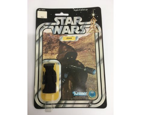 A sealed vintage Star Wars Jawa figure on Star Wars Kenner backing card.