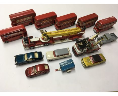 A collection of unboxed Corgi Toys ( some repainted ) including buses, a fire engine etc