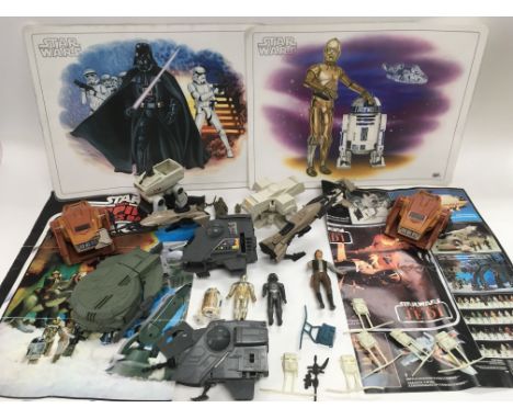 A collection of vintage Star Wars items including loose figures, mini rigs, posters and accessories.