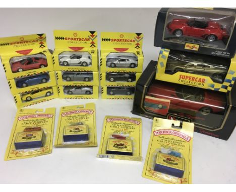 A collection of boxed model vehicles including Matchbox Originals, Burago Maisto and Shell sports car collection