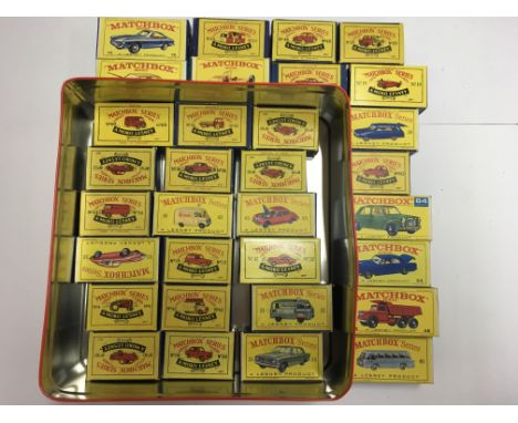 A collection of 27 boxed Matchbox 1-75 series model vehicles, four empty boxes (and one reproduction), 18 unboxed Matchbox 1-