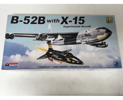 A boxed 1/72 scale Monogram B-52B with X-15 plastic kit