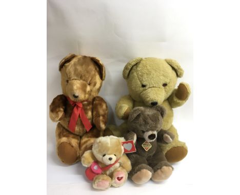 Four vintage teddy bears including a large Blue Ribbon example