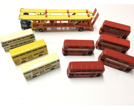 A collection of unboxed ( some repainted ) Dinky Toys including buses ,aeroplanes, army vehicles etc