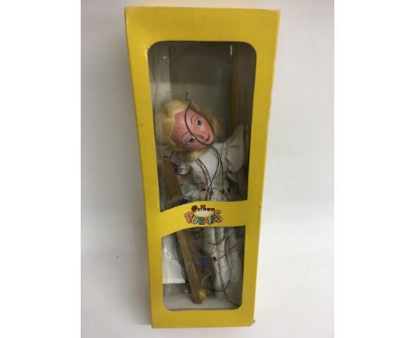 A boxed Fairy Pelham puppet