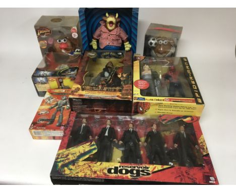 A collection of boxed toys including a 5 figure set of Reservoir dogs figs, pirates of the caribbean , Spiderman, Men in blac