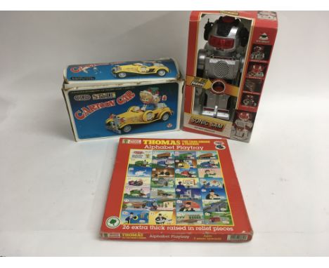 2 boxed Meccano Evolution sets No’s 2 and 4, a boxed battery operated Cartoon Car, a boxed Thomas the Tank Engine alphabet pl