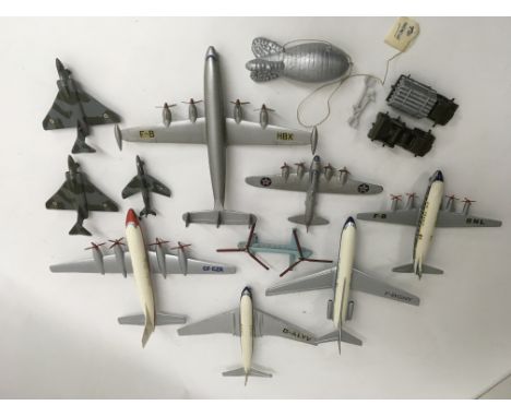 A collection of 9 unboxed Dinky Toys Aircraft including Britannia, Comet, Super G Constellation, Trident etc and a pre war Ba