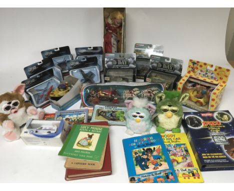 Box of various Boxed Corgi models plus various books and Tazo and Furbys and a standard Pelham puppet