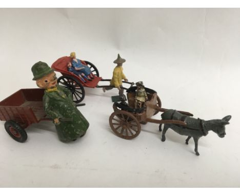 A Britain’s donkey ride cart with 2 children, a rare Rickshaw ( possibly Charbens ) with rickshaw puller and 2 passengers, an