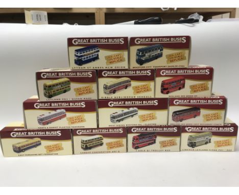 A collection of Atlas and Oxford model buses.
