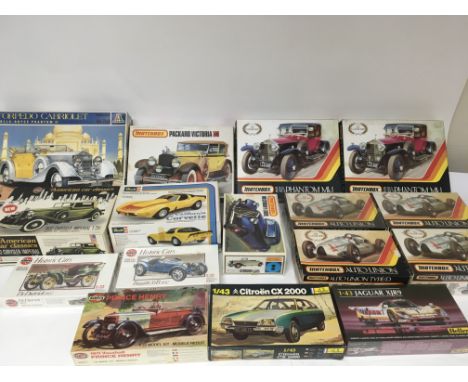 A collection of car model kits including Airfix , Matchbox, Revell etc