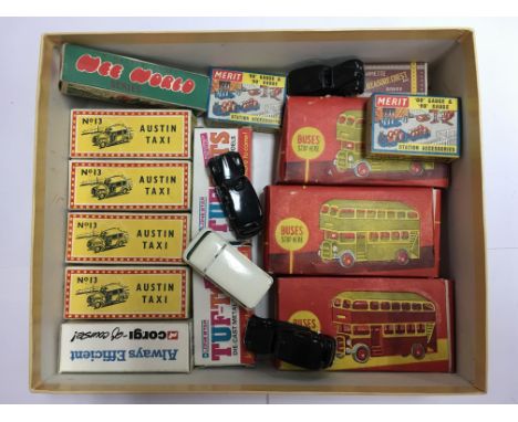 A collection of boxed and unboxed model vehicles including Tuff Tots, Austin Taxis, station accessories , london buses etc