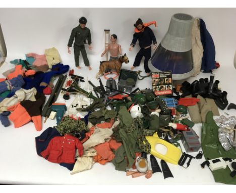 A collection of Action man toys including 3 dolls and a very large amount of clothing and accessories including a space capsu