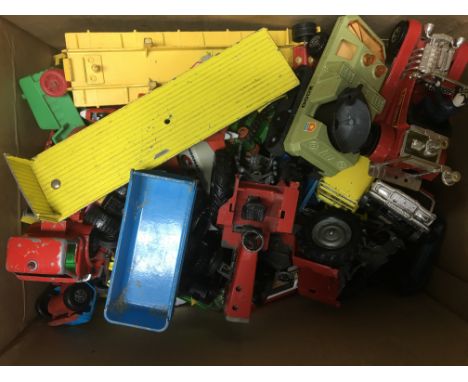 Two boxes containing a collection of playworn diecast model vehicles including TV related items