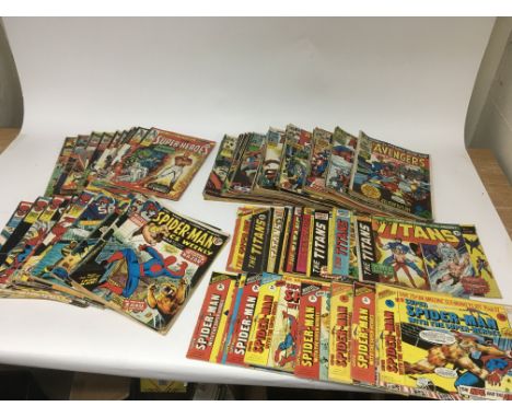 A collection of vintage Marvel comics including The Super-Heroes 1975-76, The Avengers 1973-75, Spiderman comic weekly 1974-7