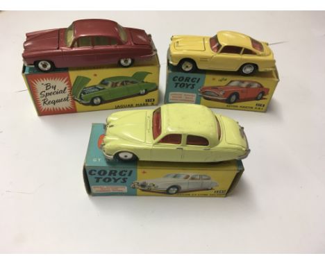 A collection of 3 boxed Corgi model vehicles including 2.4 litre jaguar No 208s in lemon, Aston Martin DB4  No 218, and Jagua