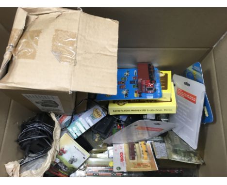 A collection of miniture carded models , diecast and plastic , HO/OO and smaller scale