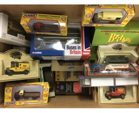 A box containing various boxed model vehicles including Vanguard, Corgi, Britbus, Models of Yesteryear, EFSI, Lledo, Classix 