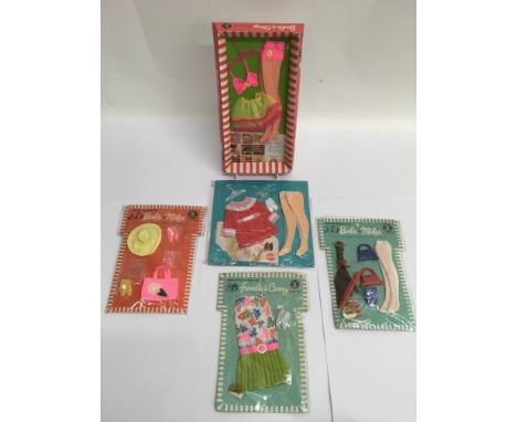 Five vintage fashion doll outfits comprising a boxed Barbie and Stacey underwear set, a carded Francie and Casey 'Slightly Su