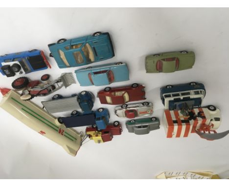 A collection 14 unboxed Corgi model vehicles including a Glider trailor with Glider, TV camera van and cameraman and Decca ai