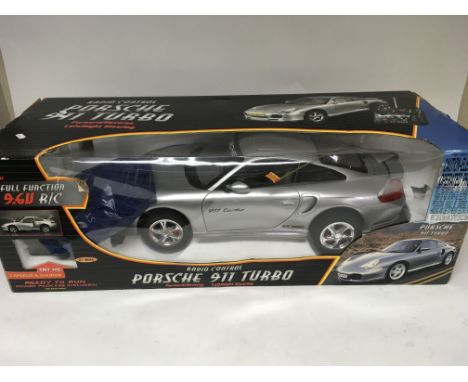 A boxed radio control Porsche 911 turbo model car