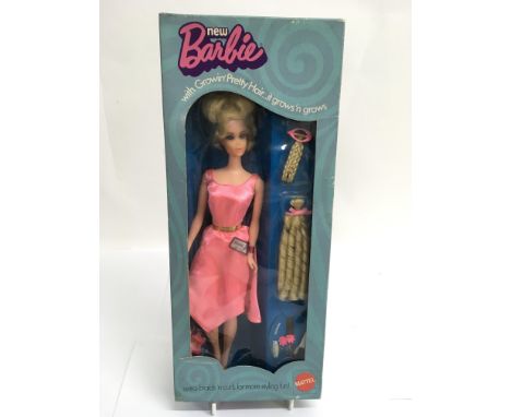 A vintage, sealed  boxed 'Growin Hair' Barbie, blonde version in pink dress