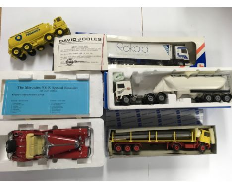 A collection of boxed model vehicles including a Franklin Mint mercedes 500 k, a Lion Toys Rokold container lorry, 146 of 300