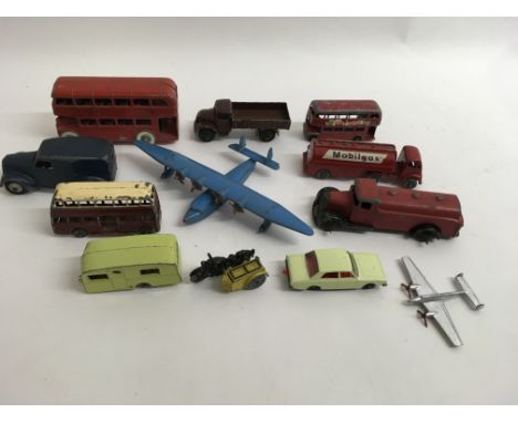 A collection of unboxed playworn model vehicles including Dinky, Corgi, and Matchbox 1-75