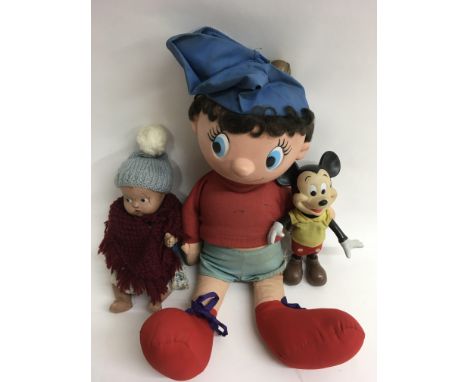 A vintage Noddy toy with talking action,not working, a Walt Disney labelled plasticl Mickey Mouse and a 1940's hard bodied do