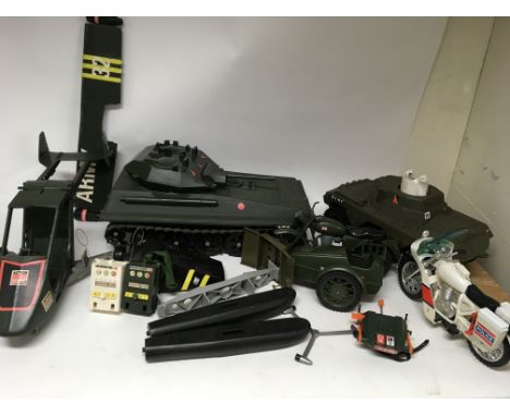 A large collection of Action man toys including Tank. Armoured vehicle. Police motorbike. Motorbike and sidecar. The are 3 dr