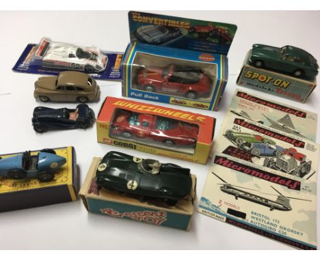 A collection of boxed model vehicles including Corgi Whizzwheels porsche 917 , Spot On Aston Martin DB mk3, Crescent Toys D t