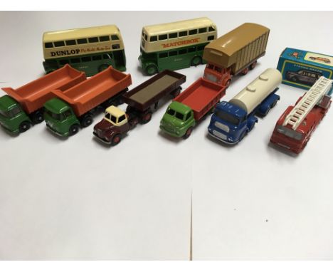 A collection of unboxed model vehicles including Britains, Budgie, Impy, and 2 repainted Dinky buses