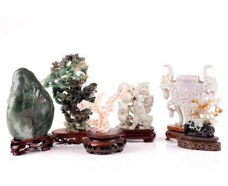 A collection of Chinese jade and hardstone carvings, Peoples Republic Period, circa 1960/70s, comprising a jade boulder carvi