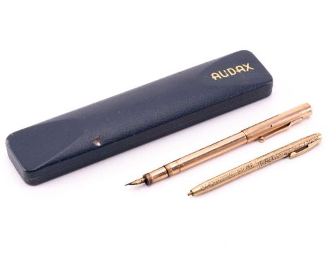 A Mabie Todd &amp; Co 'Swan' 9k gold fountain pen, circa 1925, with engine turned decoration, the body with monogram, and wit