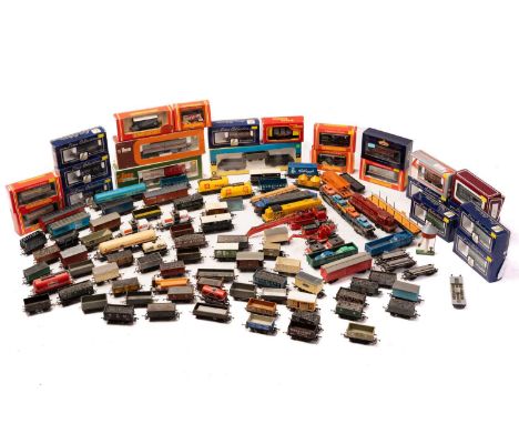A large collection of boxed and loose model railway rolling stock, to include examples from Hornby, Lima, Bachmann and others