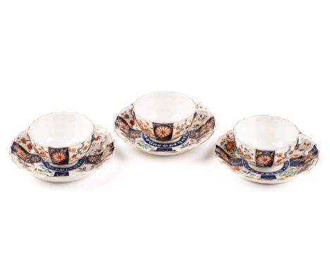 A group of three Worcester porcelain "Kakiemon" pattern tea cups and saucers, c 1770s, with shaped handles, bearing a faux se