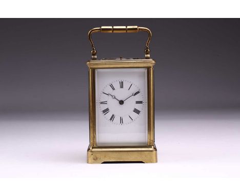 A late 19th-century French corniche-cased 8-day repeating carriage clock with silvered platform escapement and white enamel R