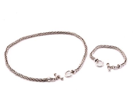 A white metal necklace and matching bracelet, both with wheat link chain and toggle clasp, the necklace 52cm long, bracelet 2