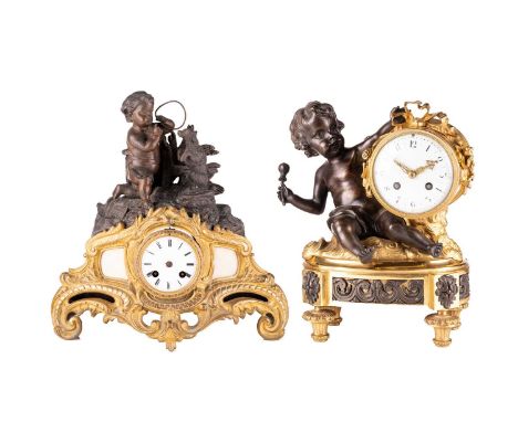 A 19th century French ormolu and bronze mantel clock, the drum form clock with enamel dial, beside a cherub holding a drum st