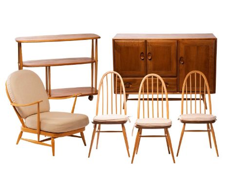 Ercol light ash and beech furniture comprising, a sideboard with a pair of cupboard doors over a drawer beside a larger cupbo