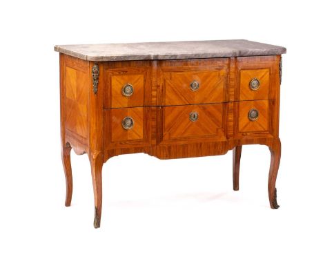 A French Louis XVI style rosewood banded kingwood breakfront commode, 19th century, with a shaped grey marble top over two lo